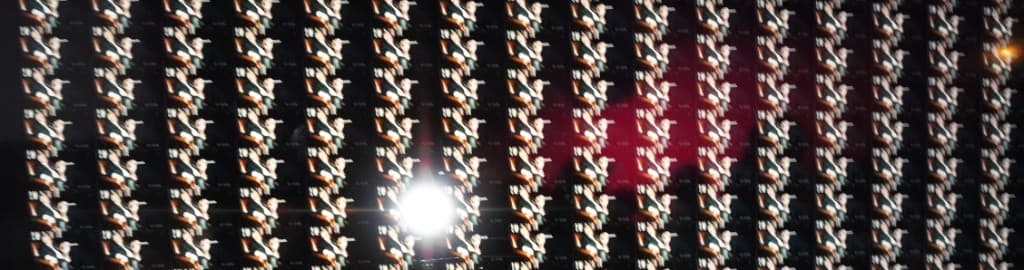 Panoramic grid of repeated frames, glitchy light and warm highlights on a dark ground—summit mood.